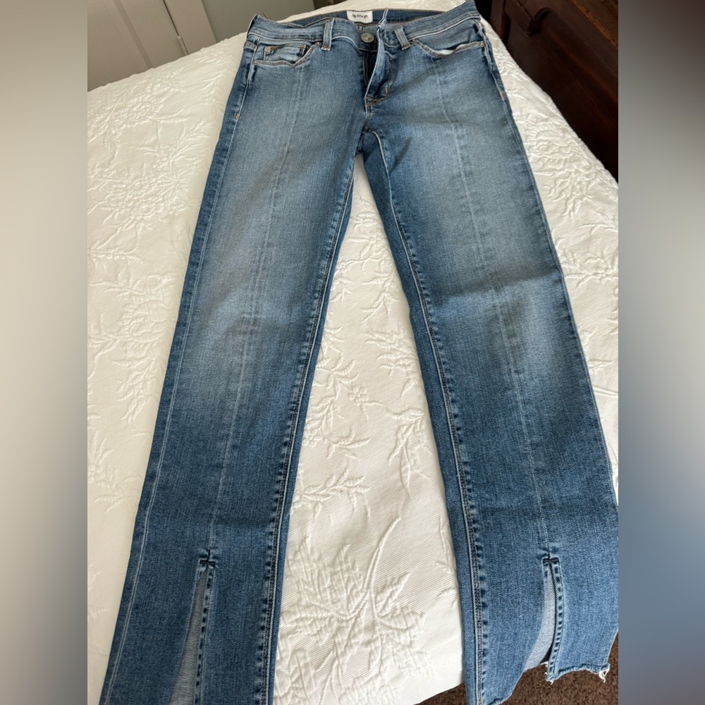 Hudson jeans that fit straight they has a slit at the bottom. Super cute!